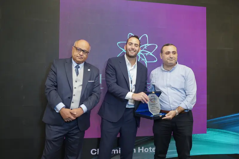 Recognition award presented on stage