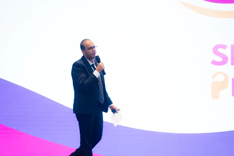 Speaker presenting on stage
